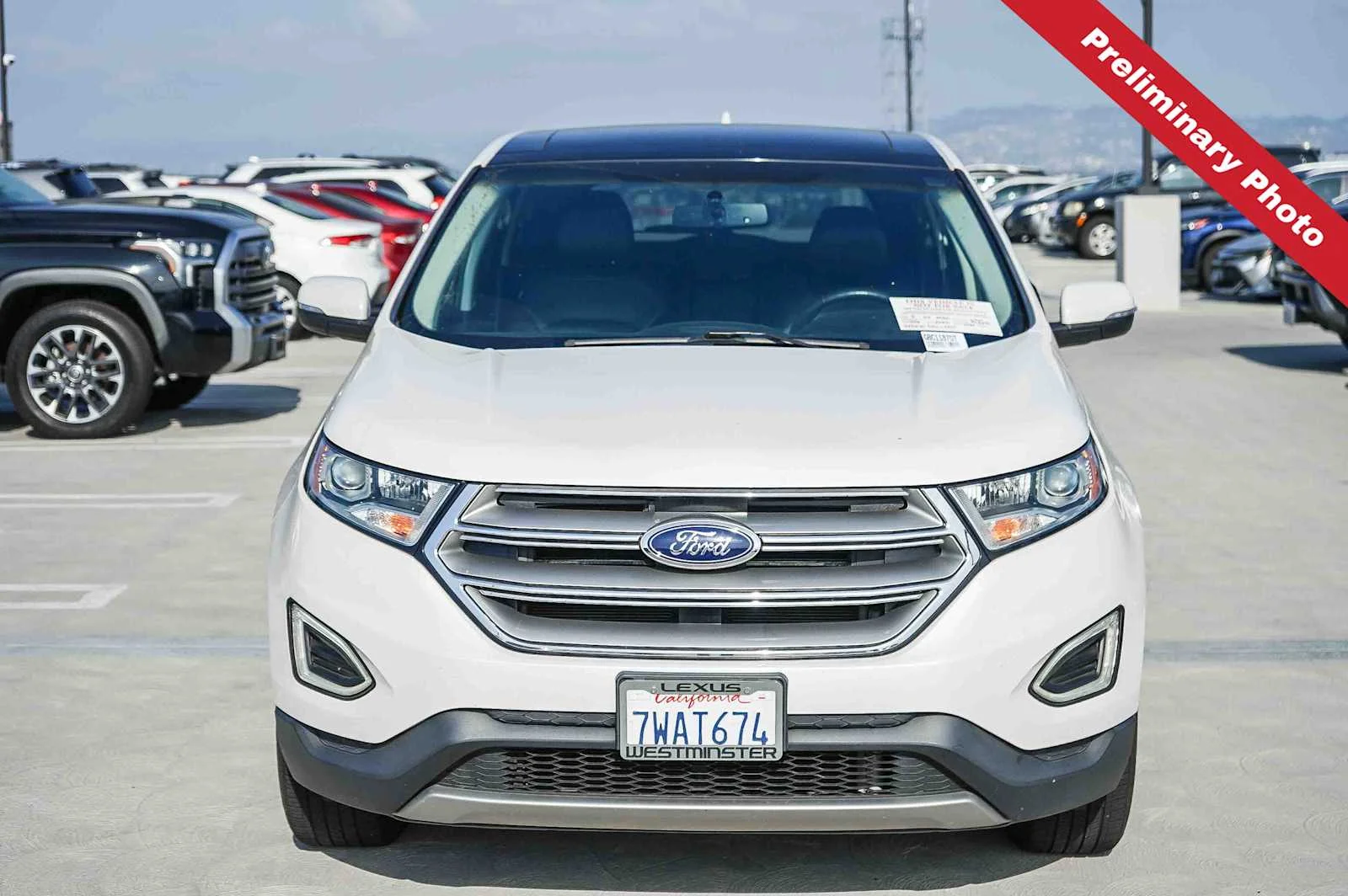 Used 2016 White Platinum Metallic Tri-Coat Ford SEL image 2
