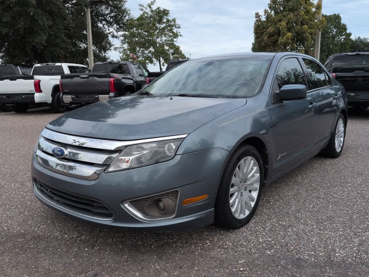 Used 2011 Ford Fusion Hybrid with VIN 3FADP0L33BR272134 for sale in Wesley Chapel, FL