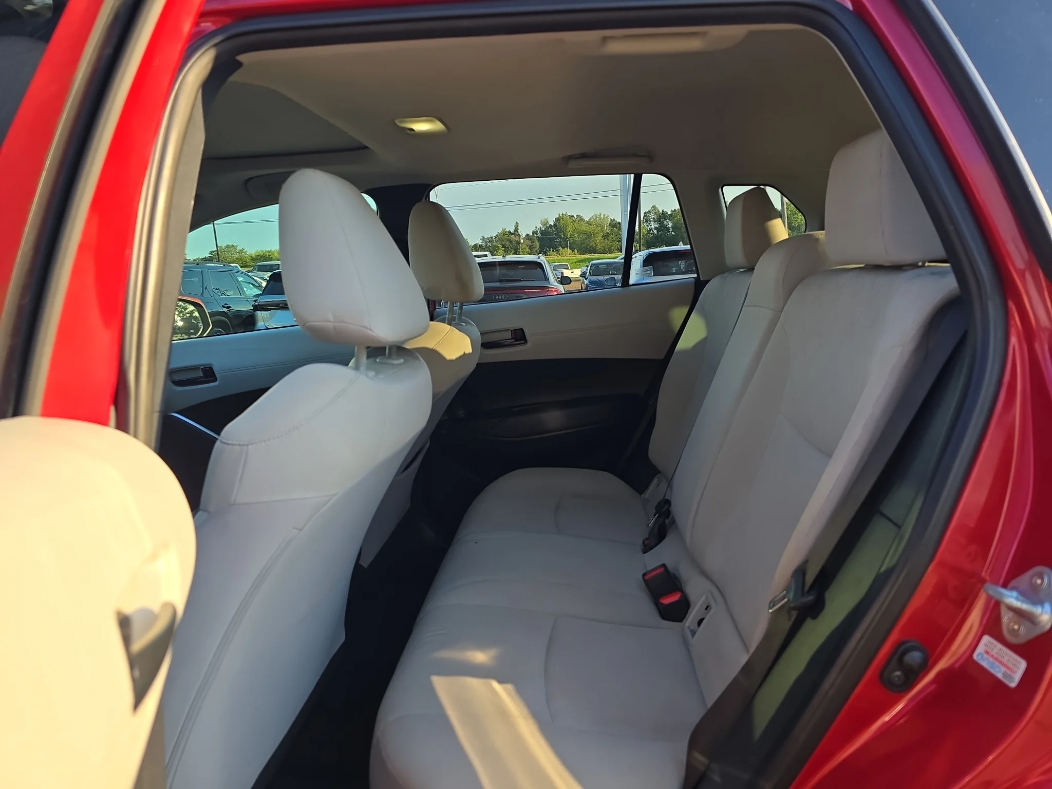 Used 2024 Barcelona Red Metallic Toyota LE image 8