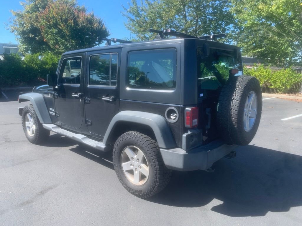 Used 2016 Black Clearcoat Jeep Unlimited Sport image 2