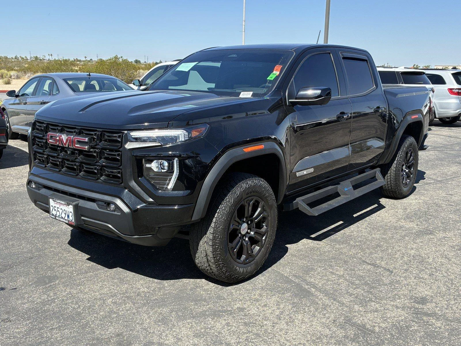 Used 2023 ONYX BLACK GMC 4WD Elevation image 3