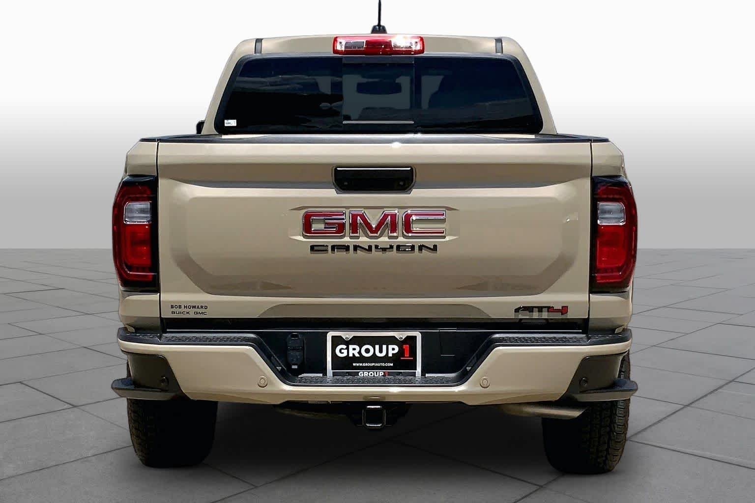 Used 2024 Desert Sand Metallic GMC 4WD AT4 image 5