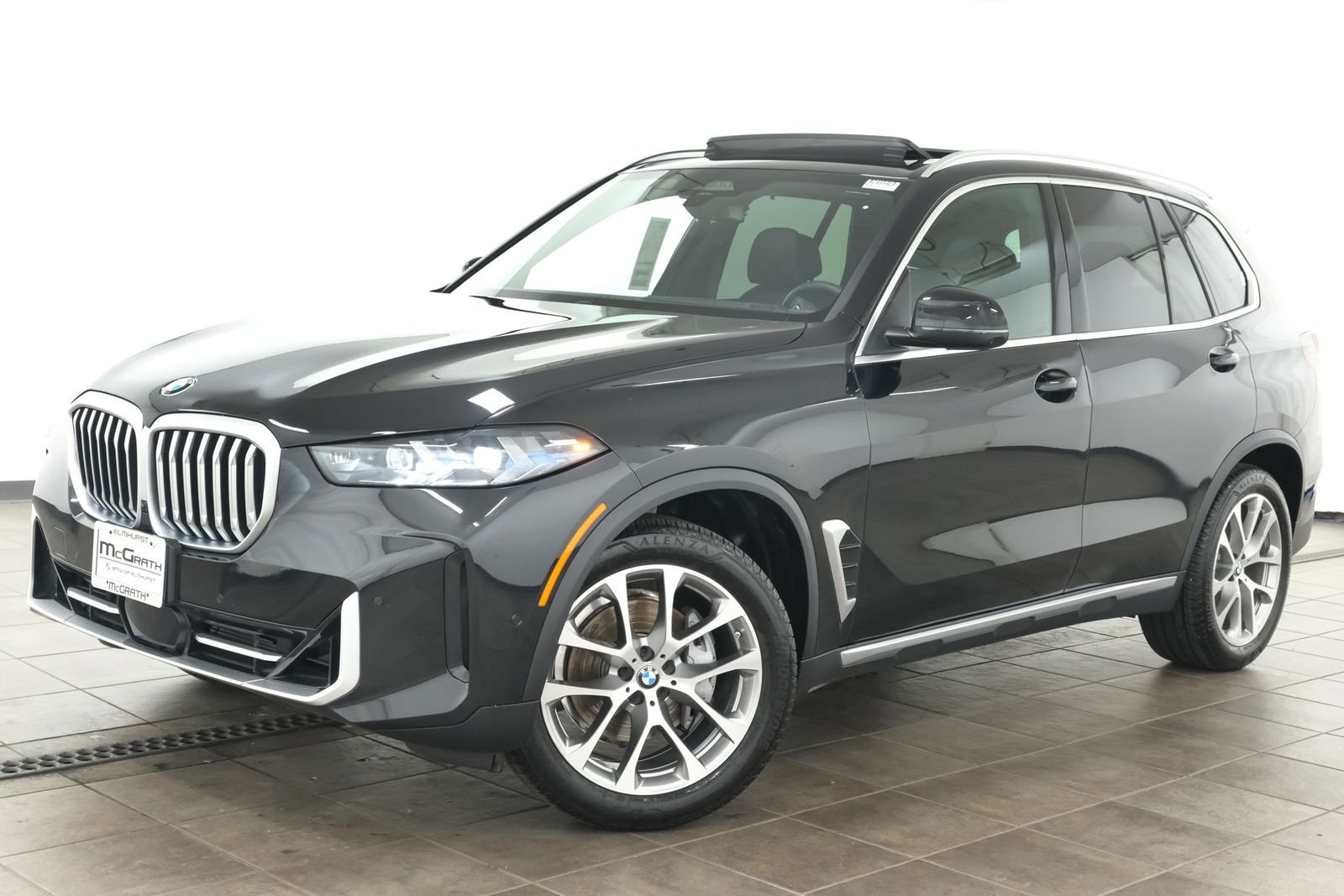 Certified Used 2026 Black Sapphire Metallic BMW xDrive40i image 1