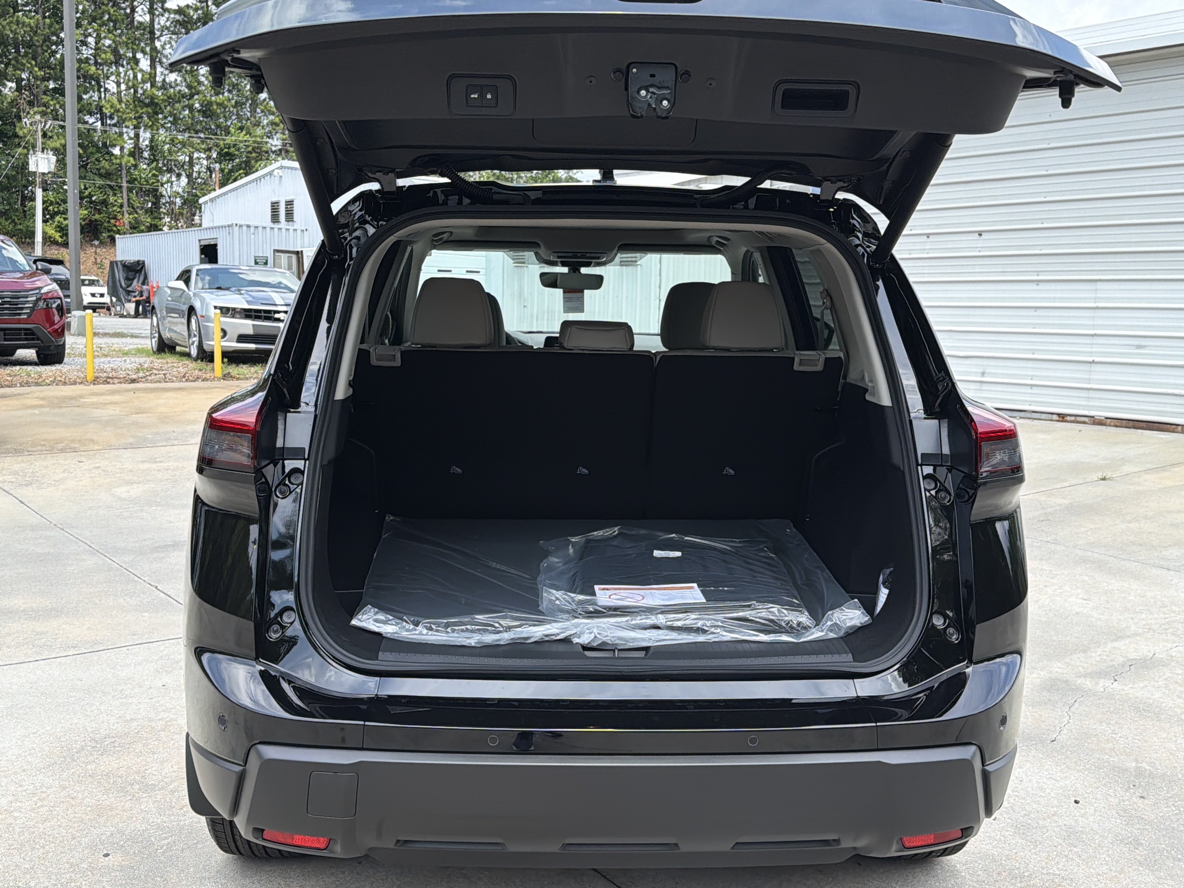 New 2026 Super Black Nissan Dark Armor image 19