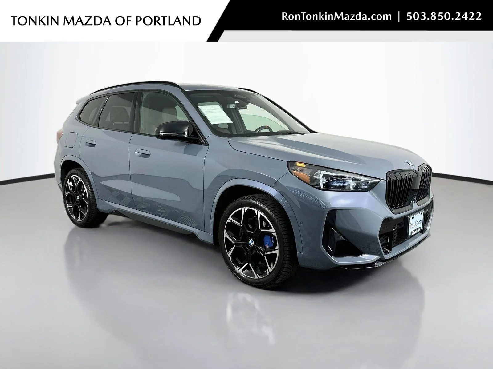 Used 2024 Storm Bay Metallic BMW M35i image 1