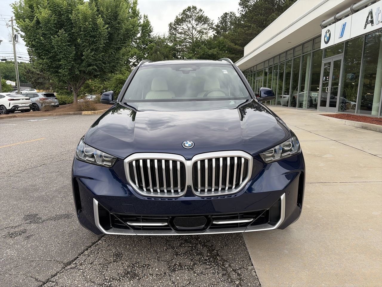 New 2026 Tanzanite Blue II Metallic BMW xDrive50e image 3