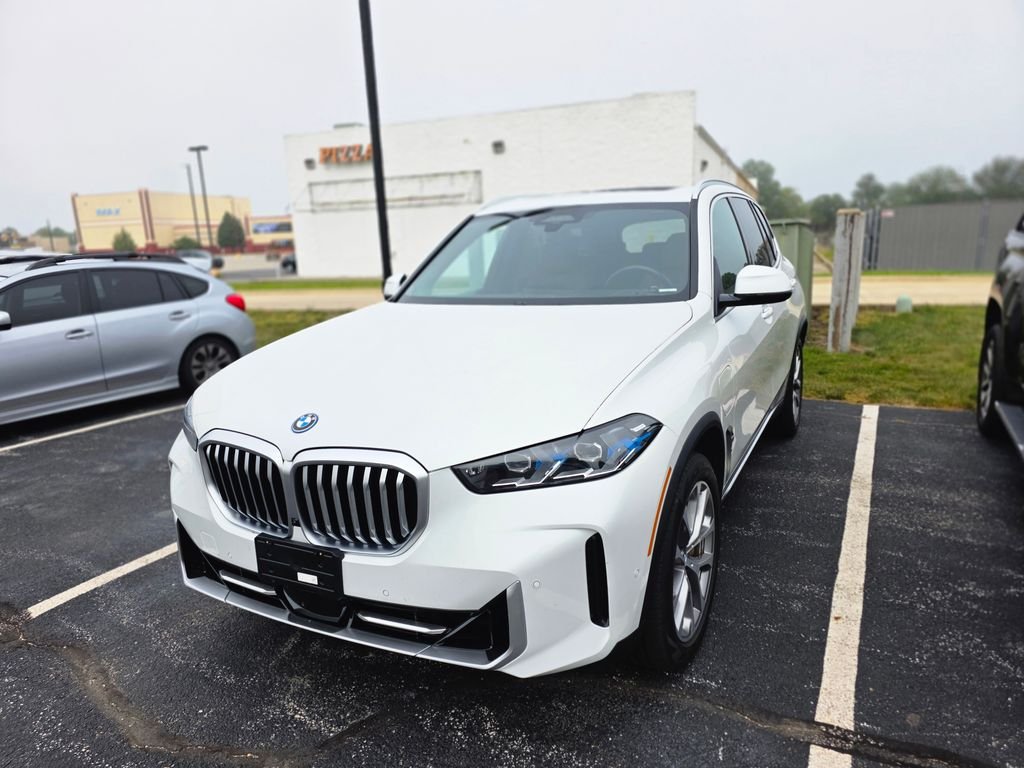 Used 2024 Mineral White Metallic BMW xDrive50e image 2
