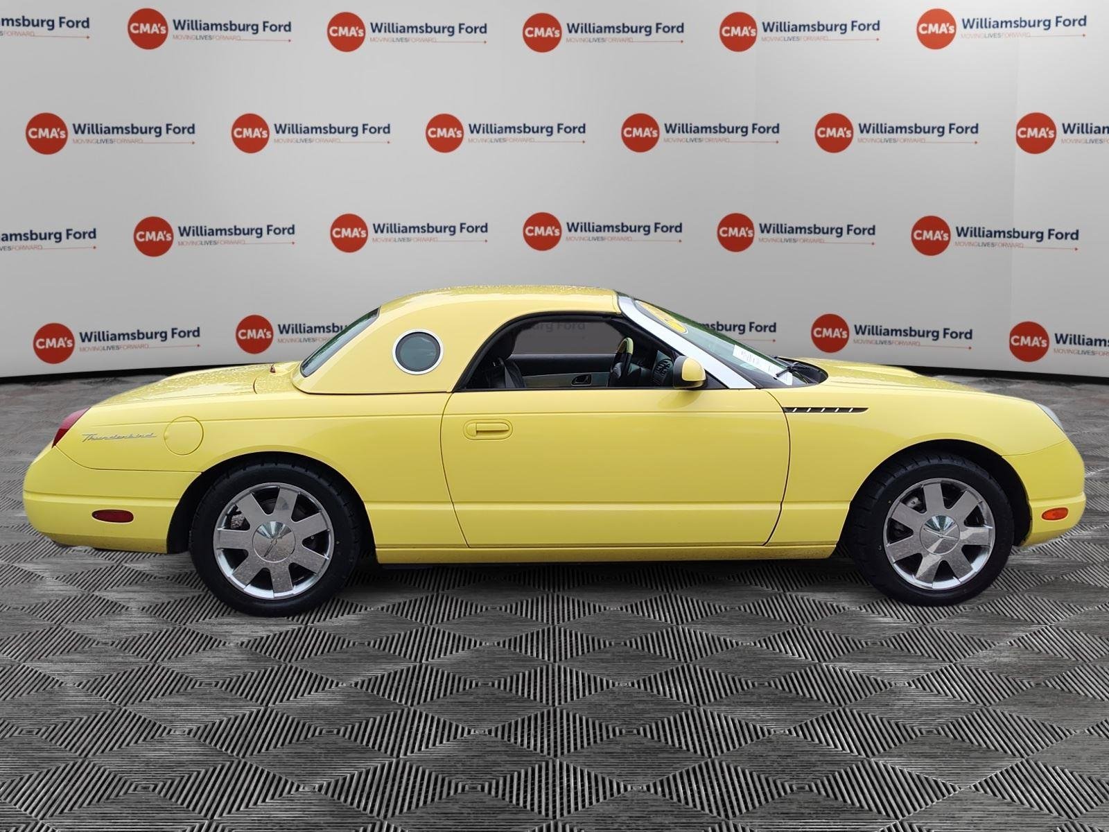 Used 2002 Inspiration Yellow Ford Deluxe image 6