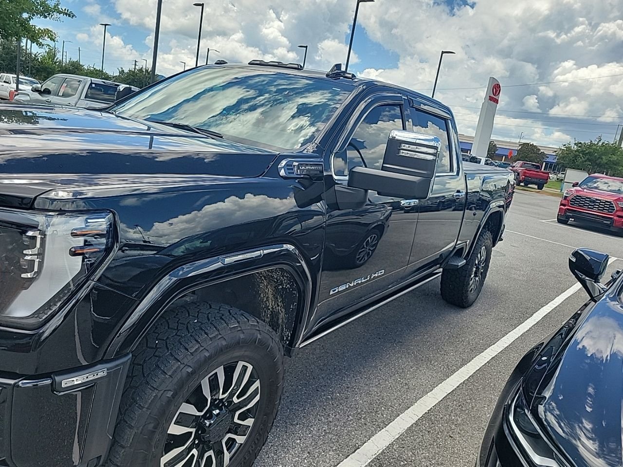 Used 2025 Black GMC Denali Ultimate image 1