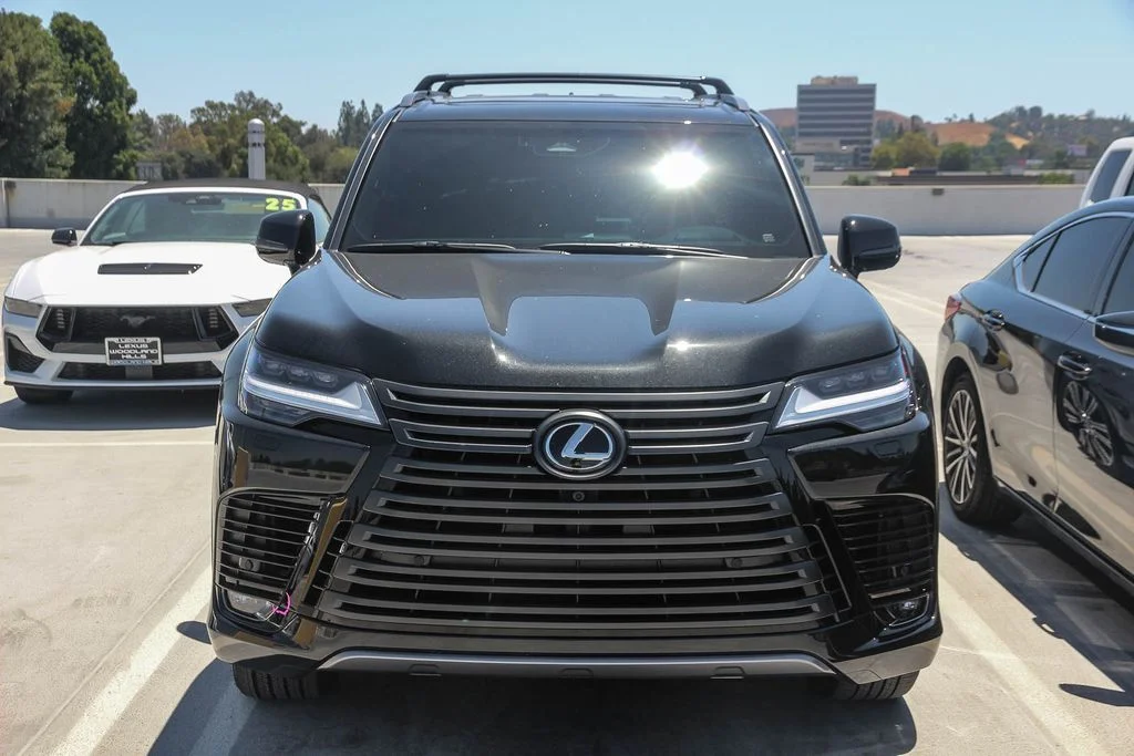Used 2025 Black Lexus 700h Luxury image 2