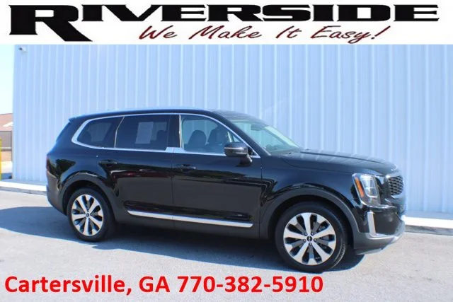 Used 2022 Ebony Black Kia EX image 1