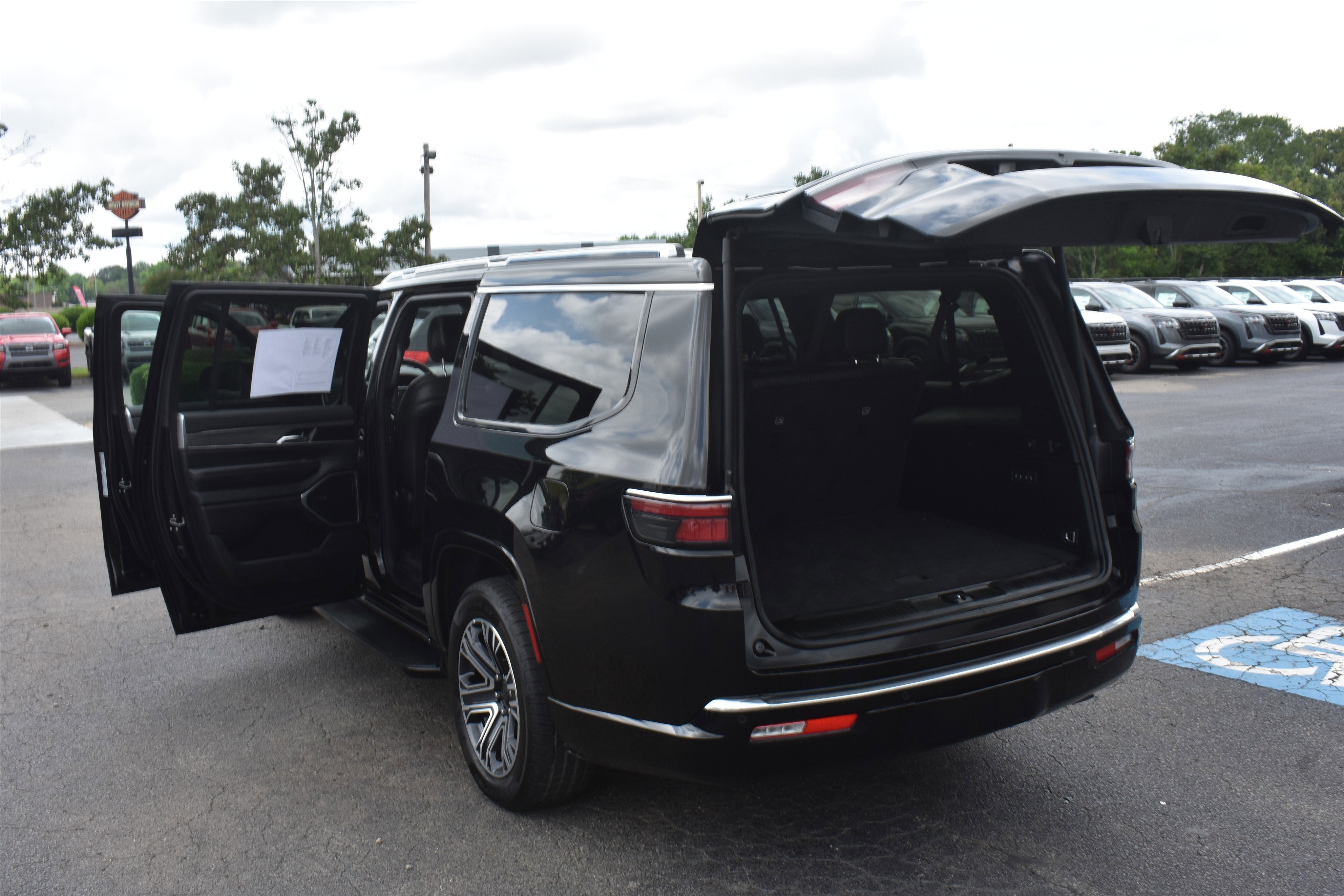 Used 2023 Diamond Black Crystal Pearlcoat Jeep Series II image 17