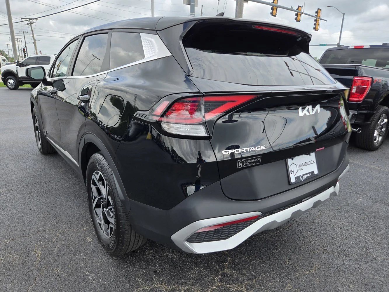 Used 2025 Ebony Black Kia LX image 7