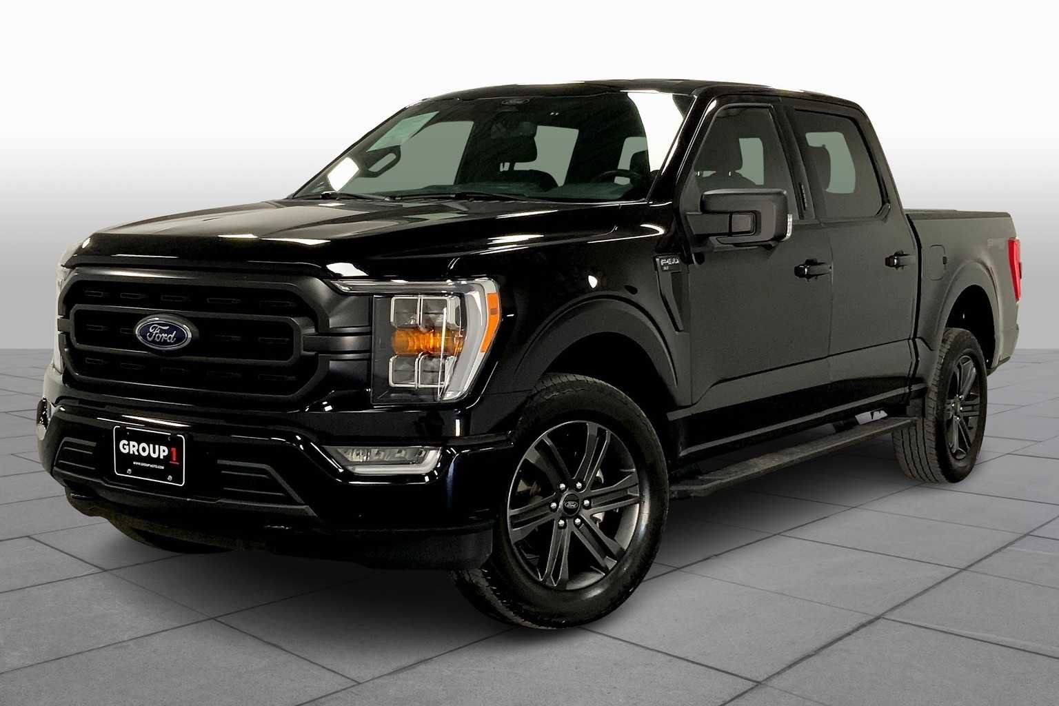 Used 2022 Agate Black Metallic Ford XLT image 2