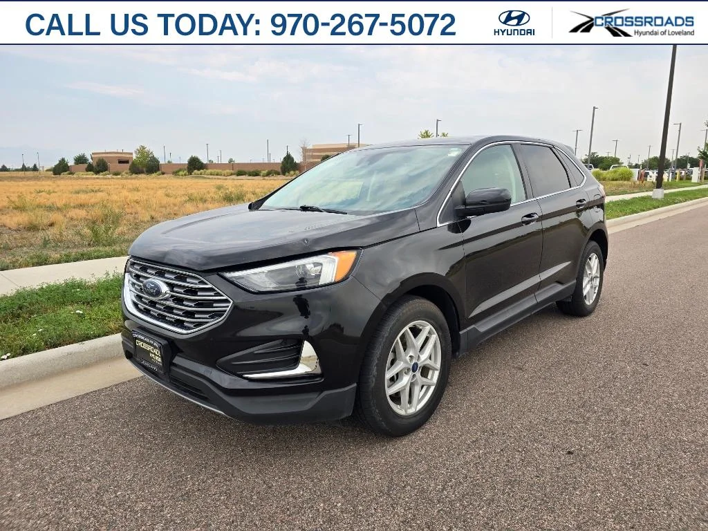 Used 2022 Agate Black Metallic Ford SEL image 1