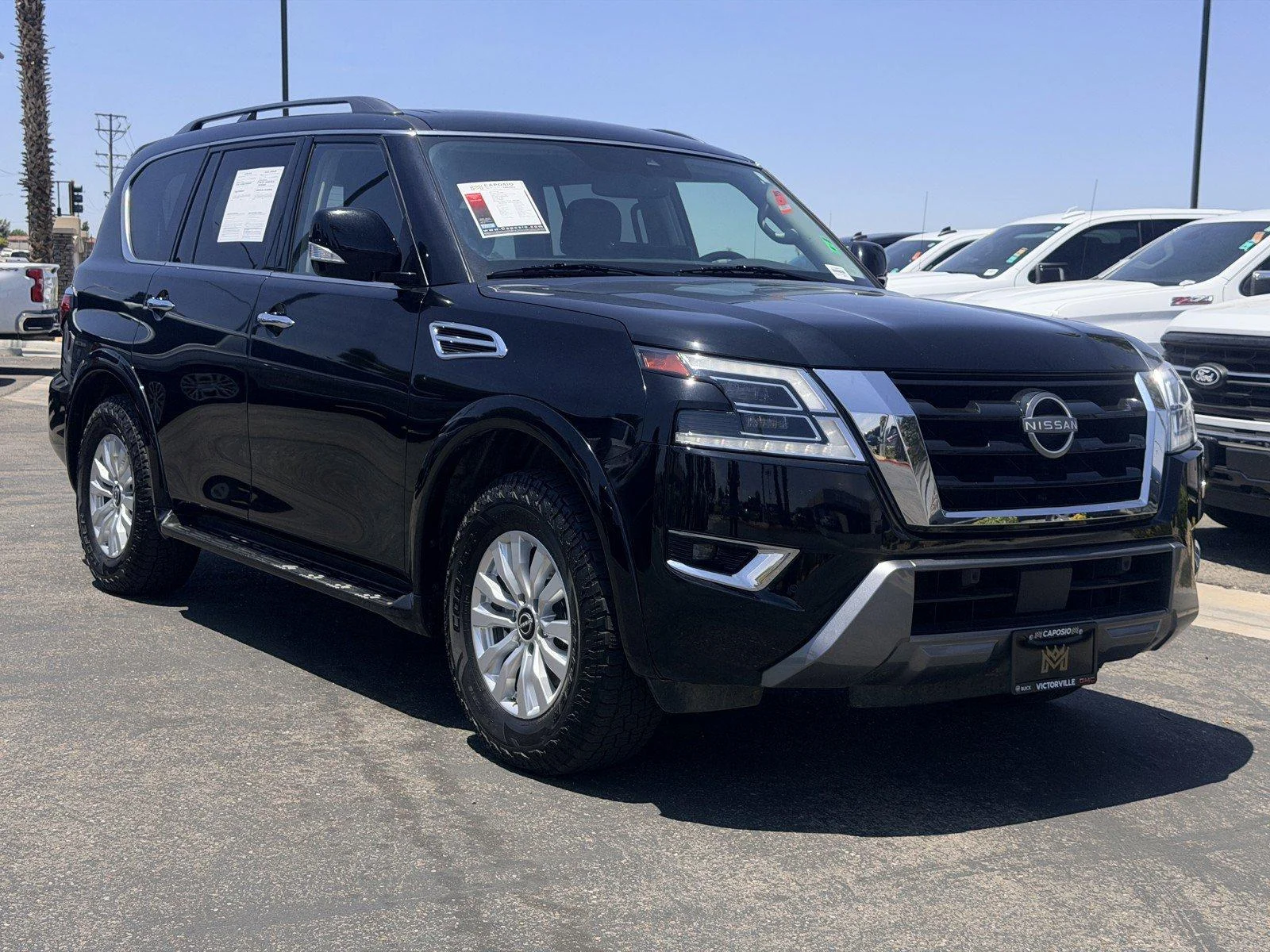 Used 2023 Super Black Nissan SV image 1