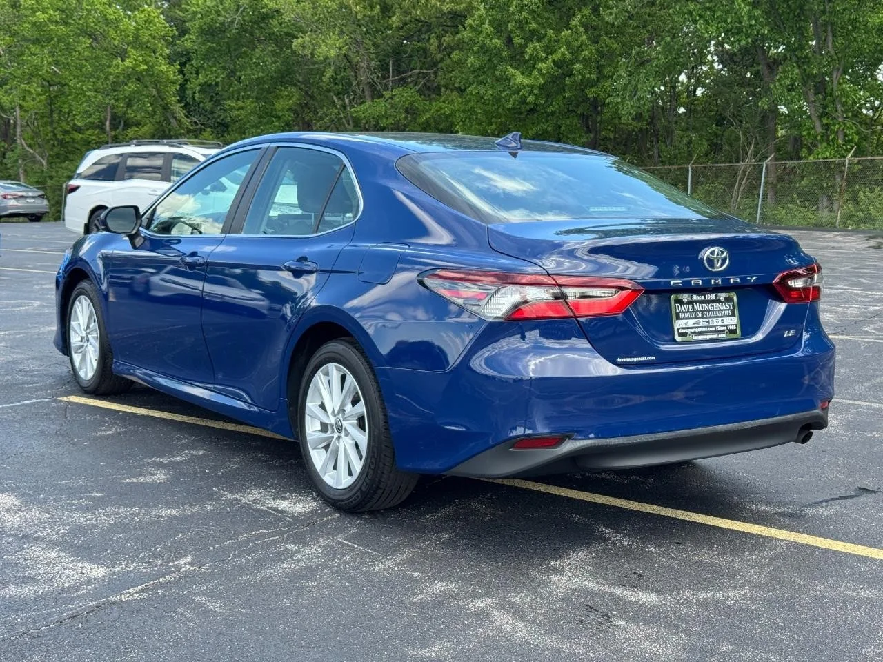 Used 2024 Reservoir Blue Toyota LE image 7