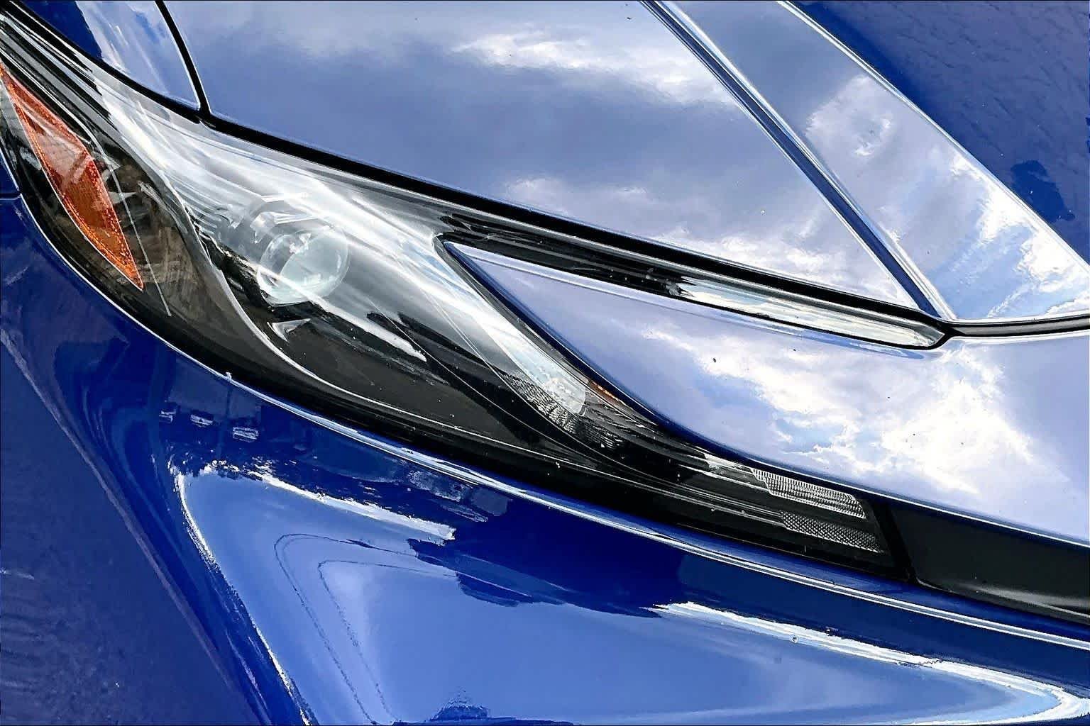 Used 2025 Reservoir Blue Toyota LE image 28