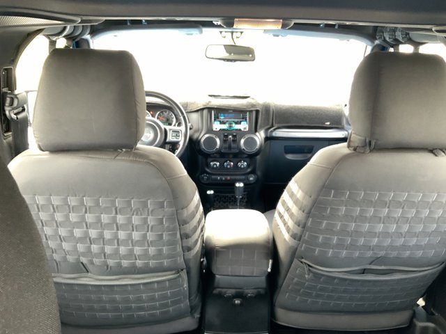 Used 2015 Jeep Wrangler Sport with VIN 1C4AJWAGXFL589145 for sale in Kansas City