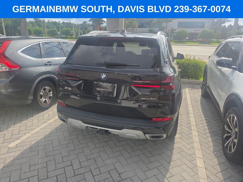 Certified Used 2024 Black Sapphire Metallic BMW sDrive40i image 11