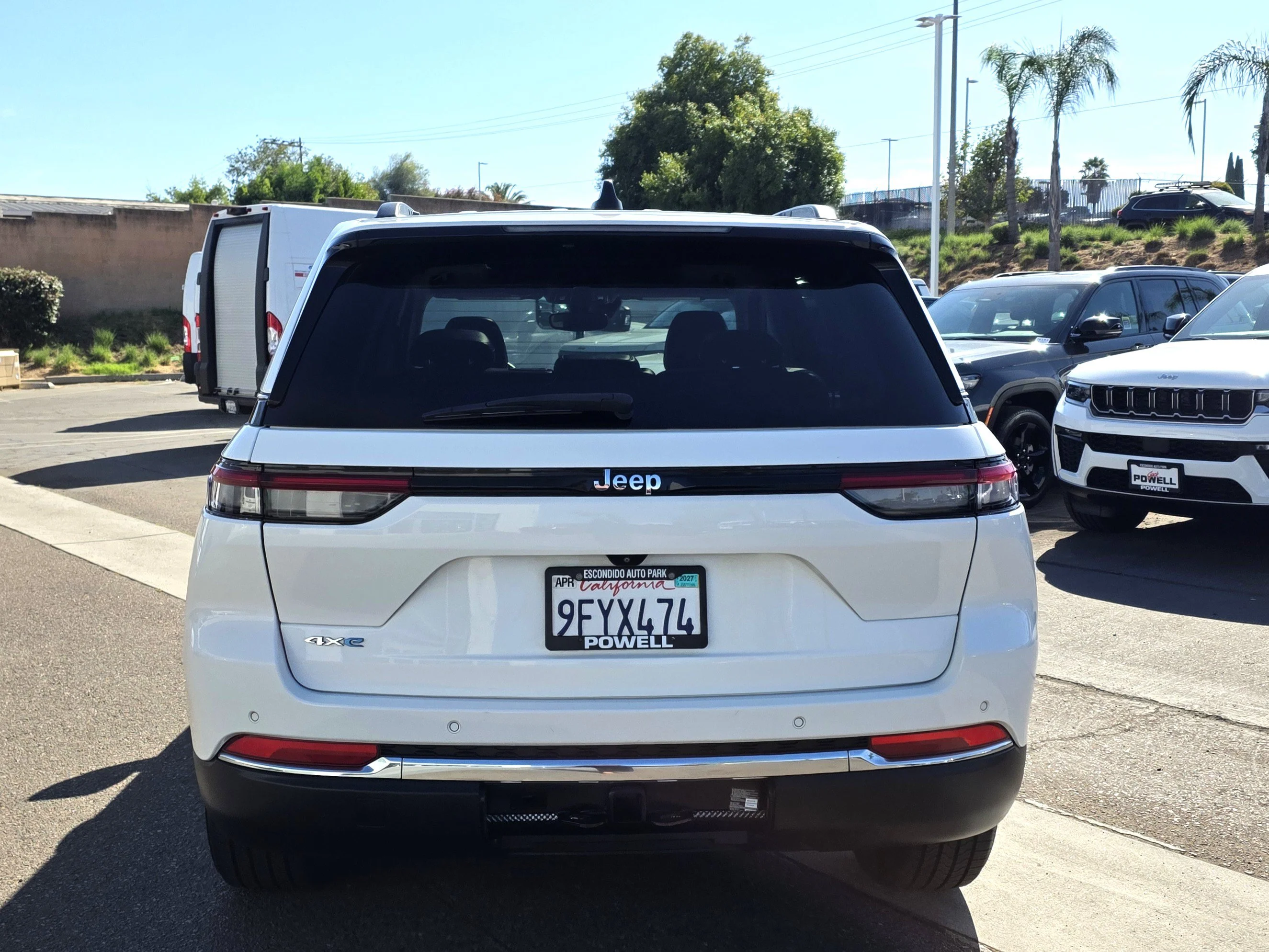 Used 2023 Bright White Clearcoat Jeep 4xe image 4