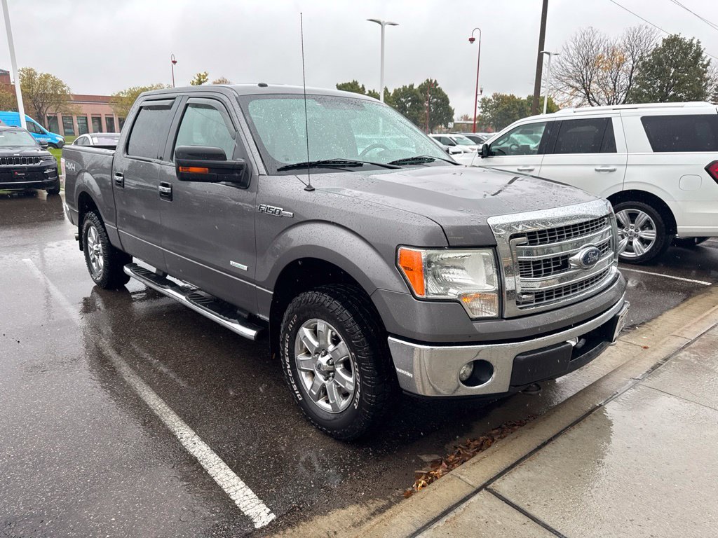 Used 2013 Gray Ford XLT image 1