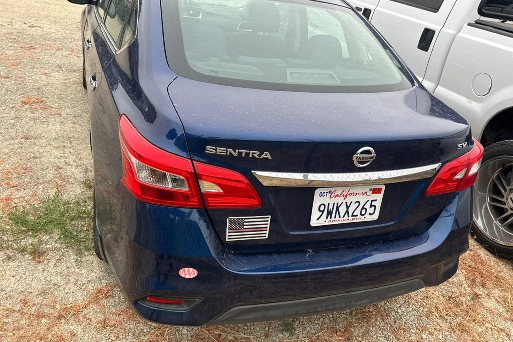 Used 2016 Deep Blue Pearl Nissan SV image 6
