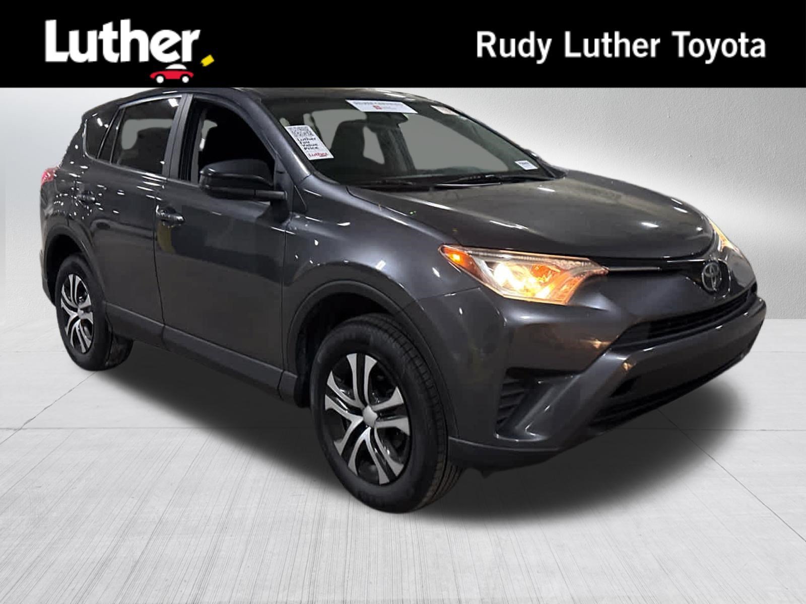 Used 2018 Magnetic Gray Metallic Toyota LE image 1