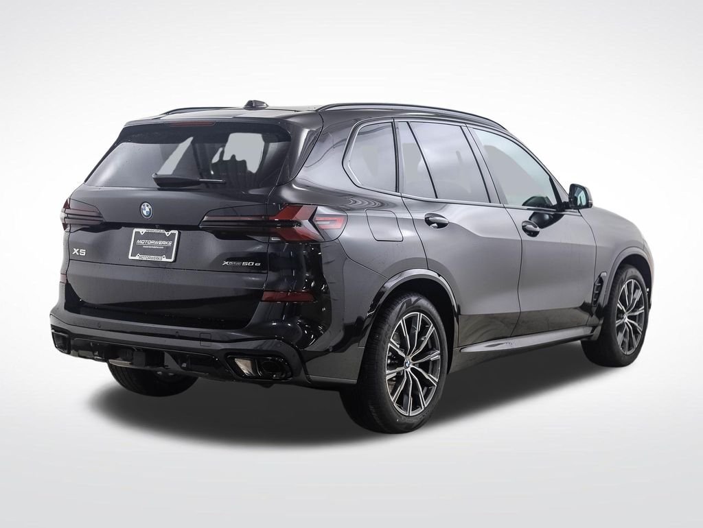 New 2026 Black Sapphire Metallic BMW xDrive50e image 5