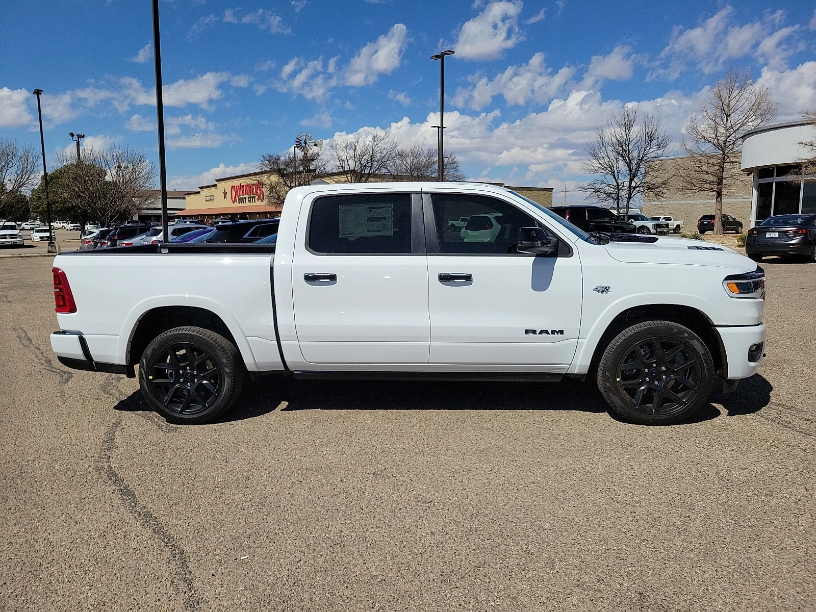 New 2026 Bright White Ram LIMITED CREW CAB 4X4 5