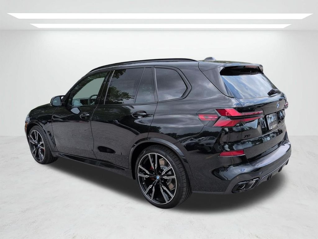 New 2026 Black Sapphire Metallic BMW M60i image 6