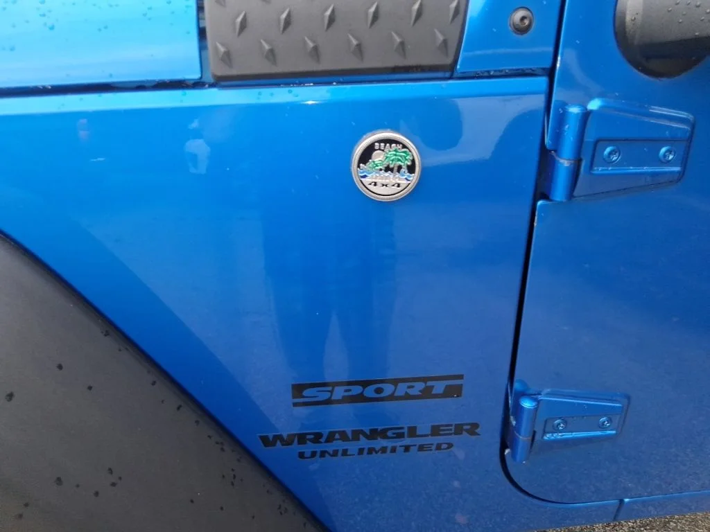 Used 2015 Blue Jeep Unlimited Sport image 13