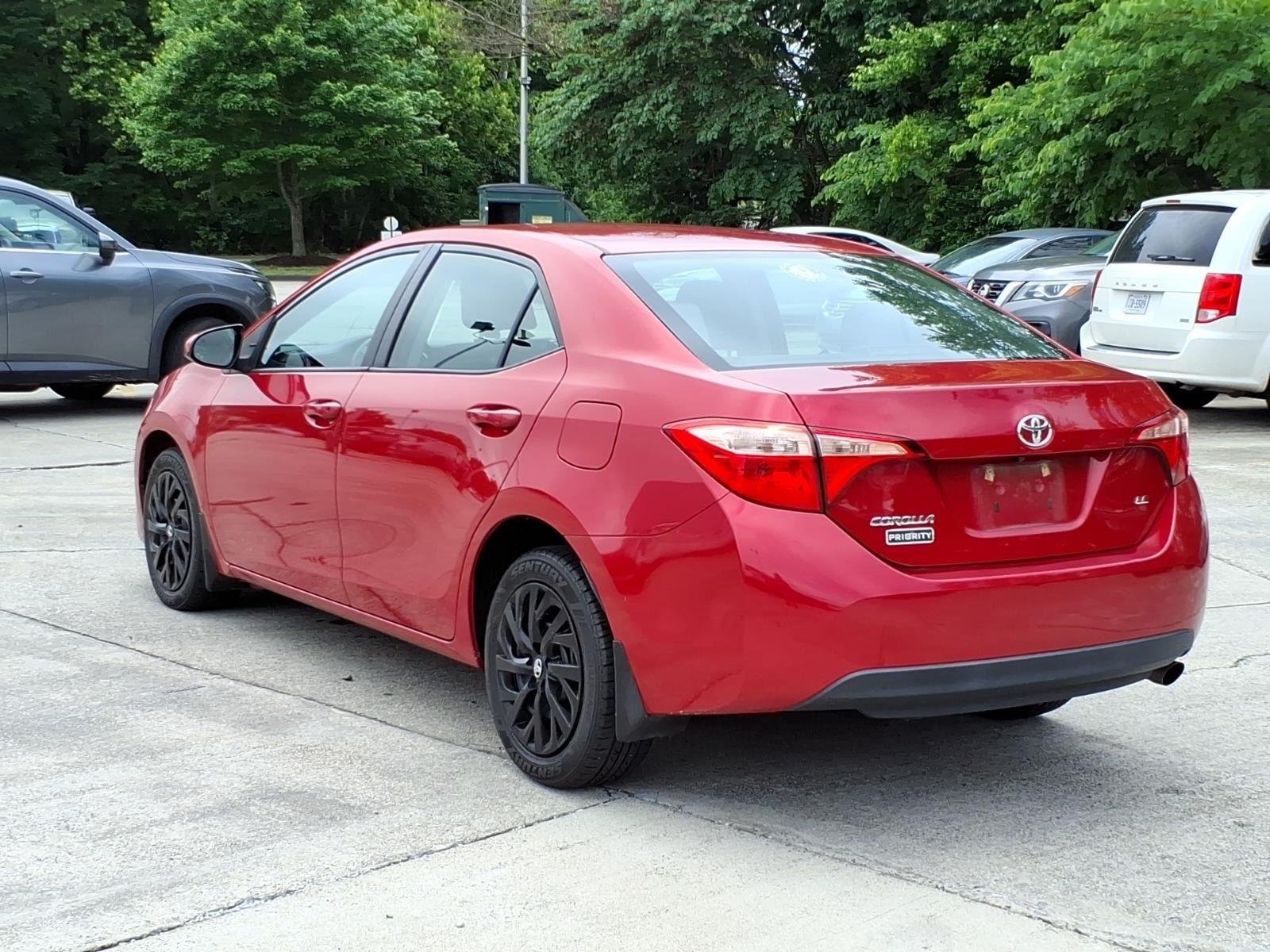 Used 2018 Barcelona Red Metallic Toyota LE image 11