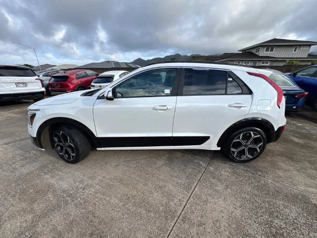 Certified Used 2025 White Kia EX Touring image 2