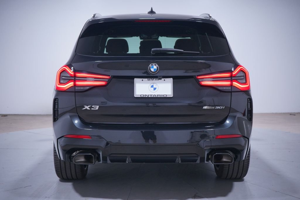 Certified Used 2024 Black Sapphire Metallic BMW sDrive30i image 5