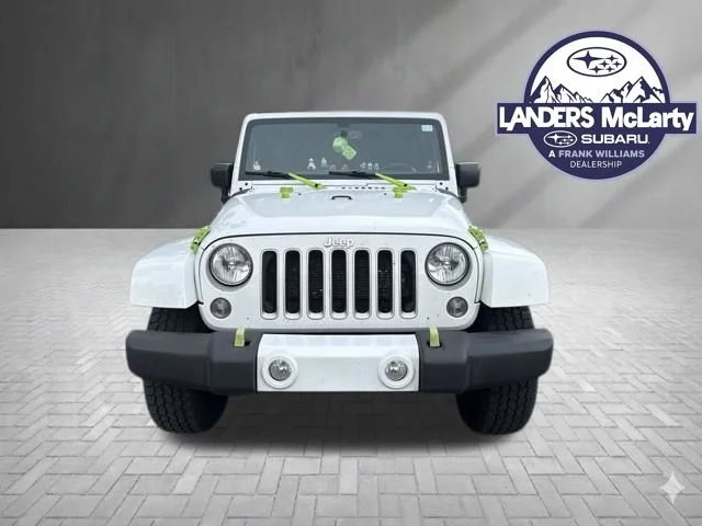 Used 2016 White Jeep Unlimited Sahara image 7