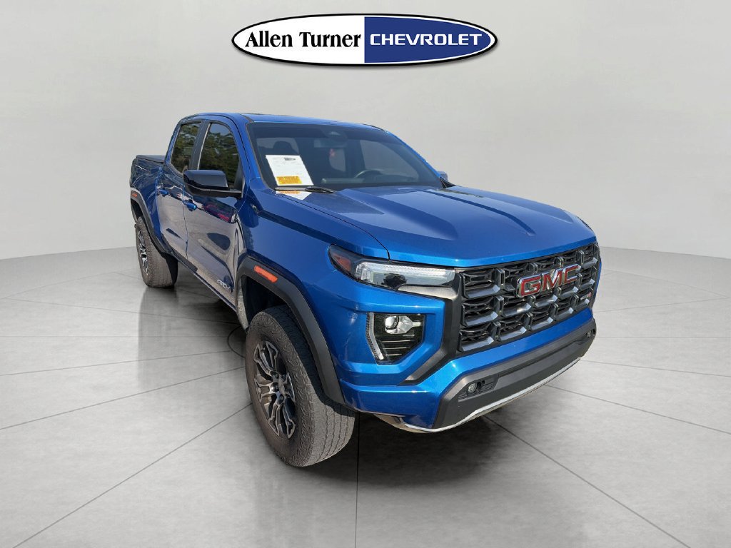 Used 2023 DYNAMIC BLUE METALLIC GMC 4WD AT4 image 3