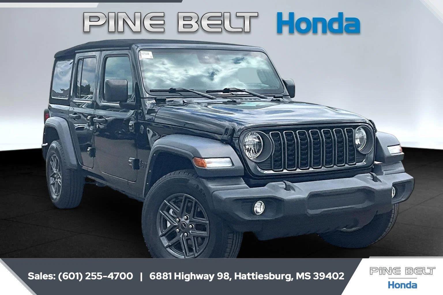 Used 2024 Black Clearcoat Jeep Sport S image 1