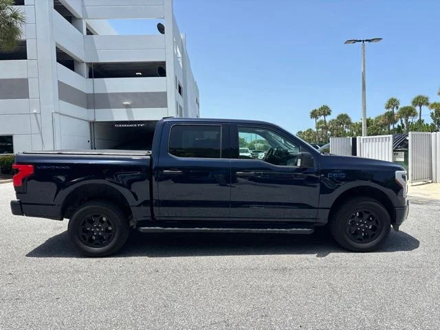 Used 2025 Ford F-150 Lightning XLT with VIN 1FTVW3LK6SWG03683 for sale in Delray Beach, FL