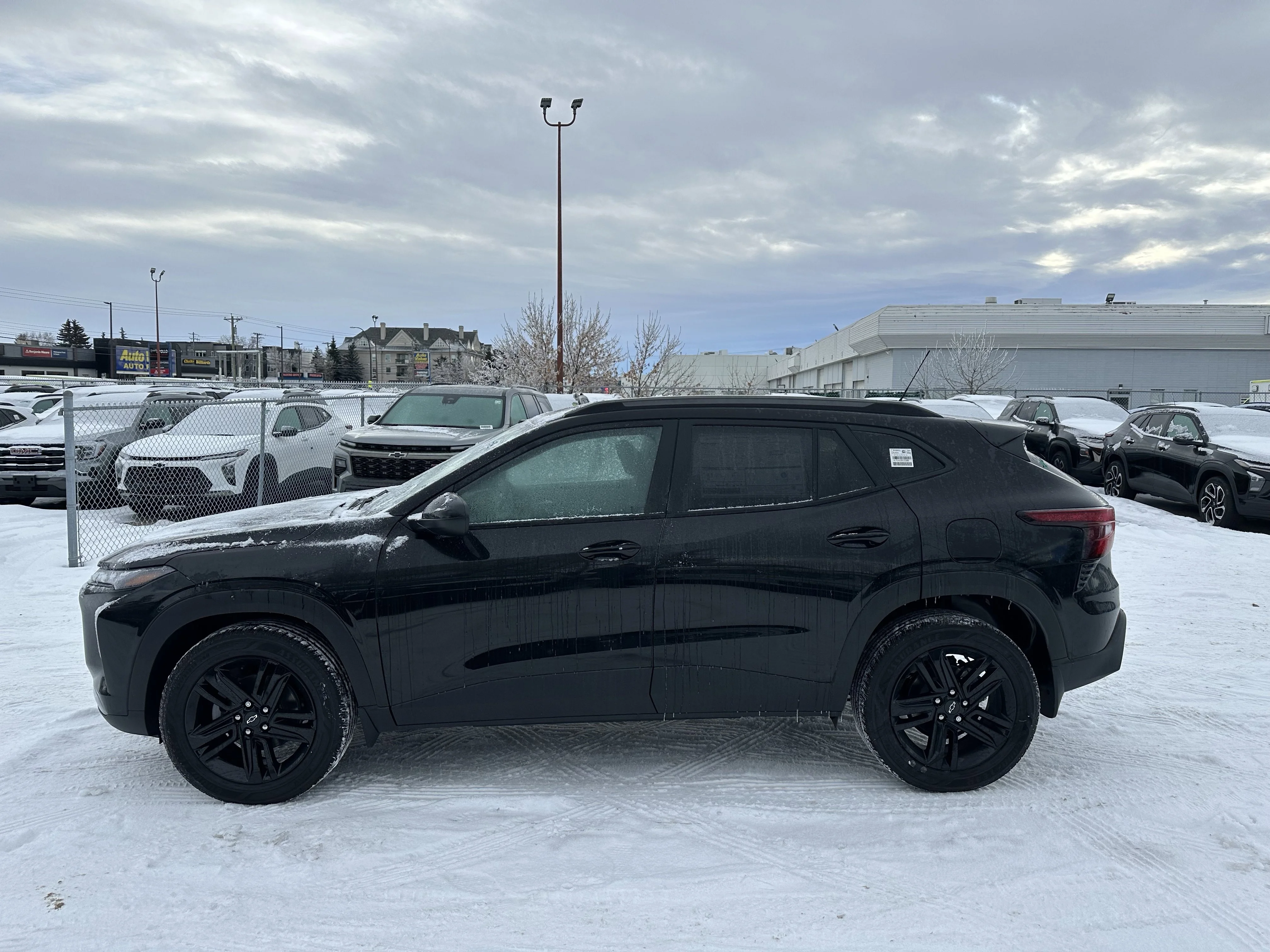 New 2026 Mosaic Black Metallic Chevrolet ACTIV image 2