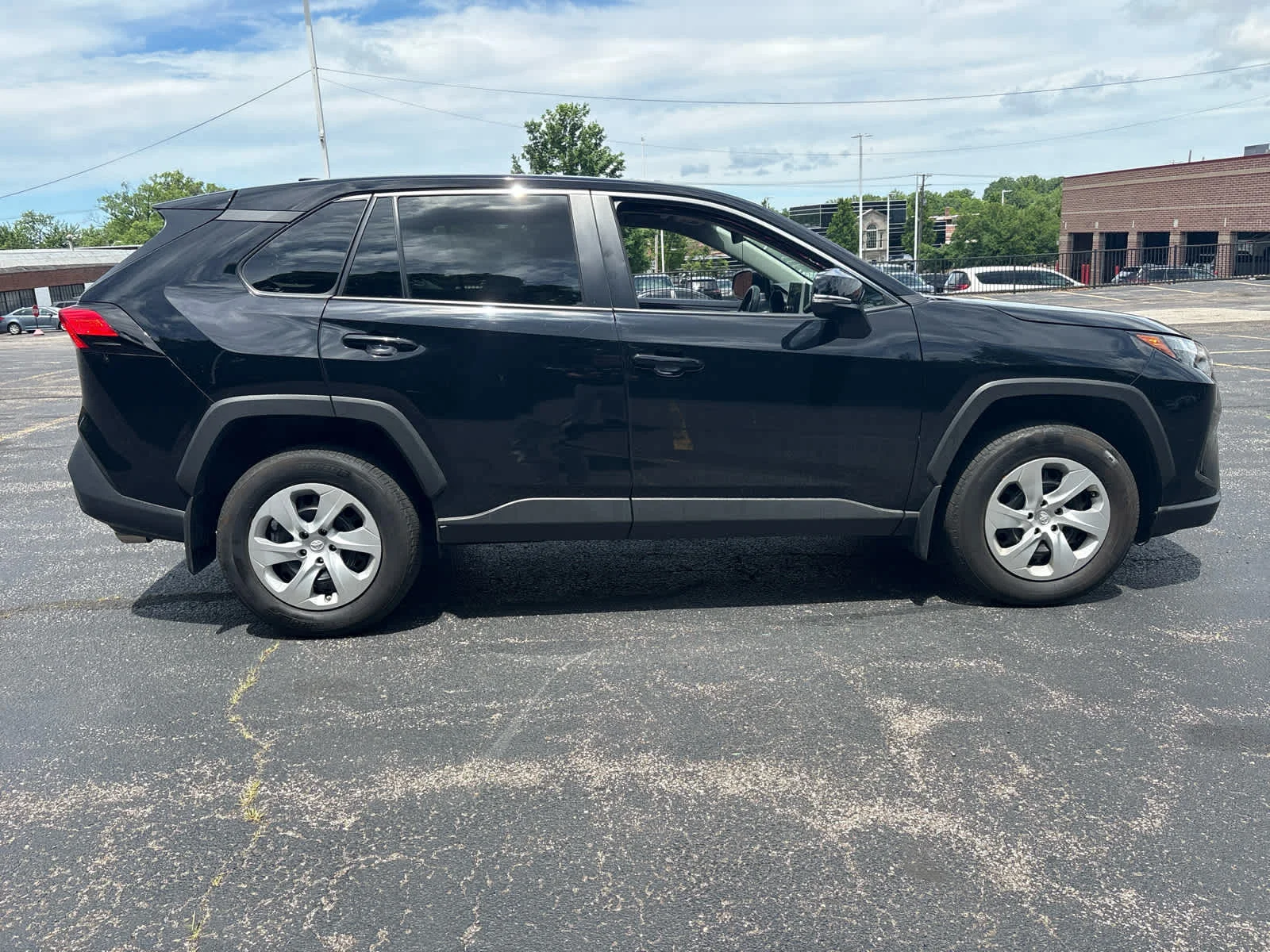 Used 2024 Midnight Black Metallic Toyota LE image 9