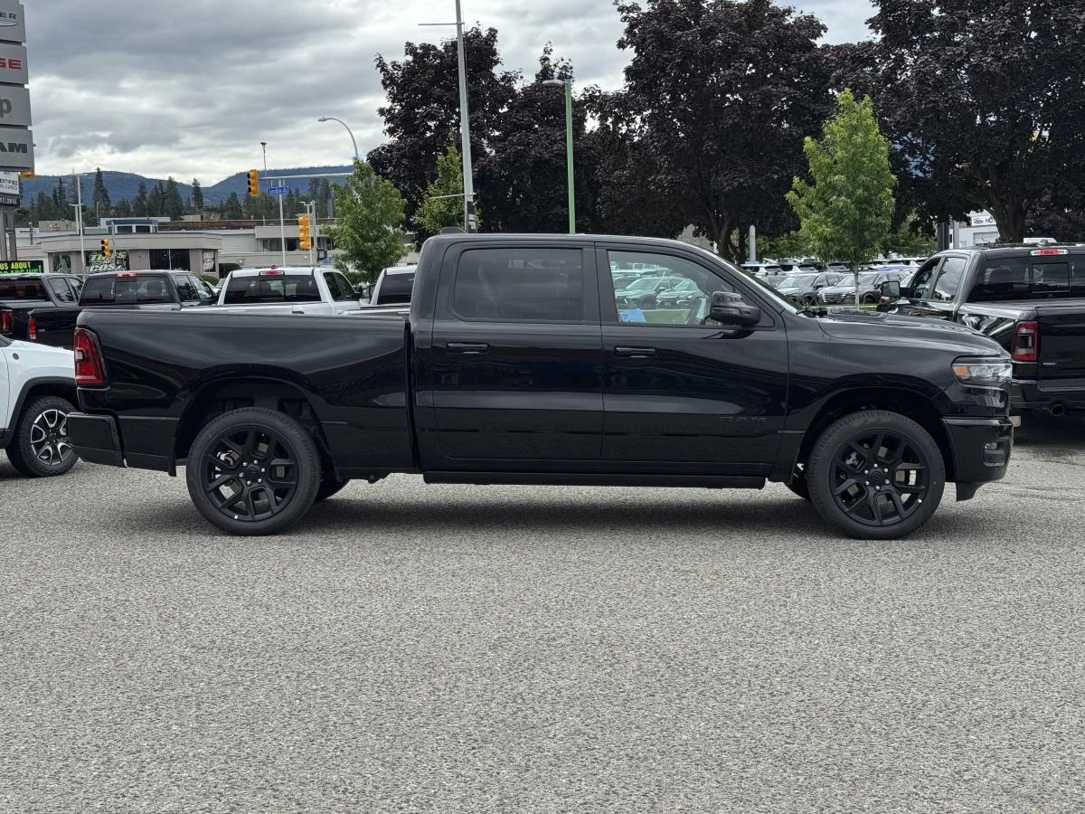 New 2026 Black RAM Sport 4x4 Crew Cab 6