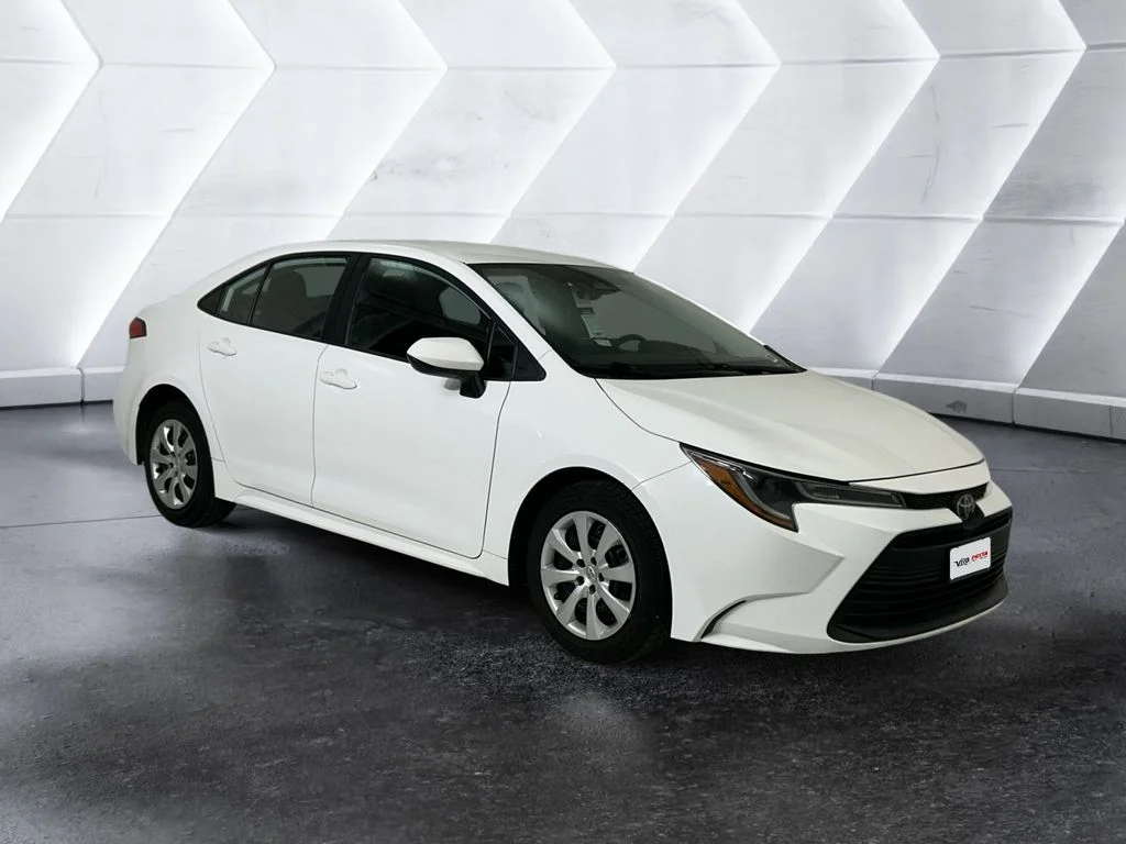 Used 2023 White Toyota LE image 1