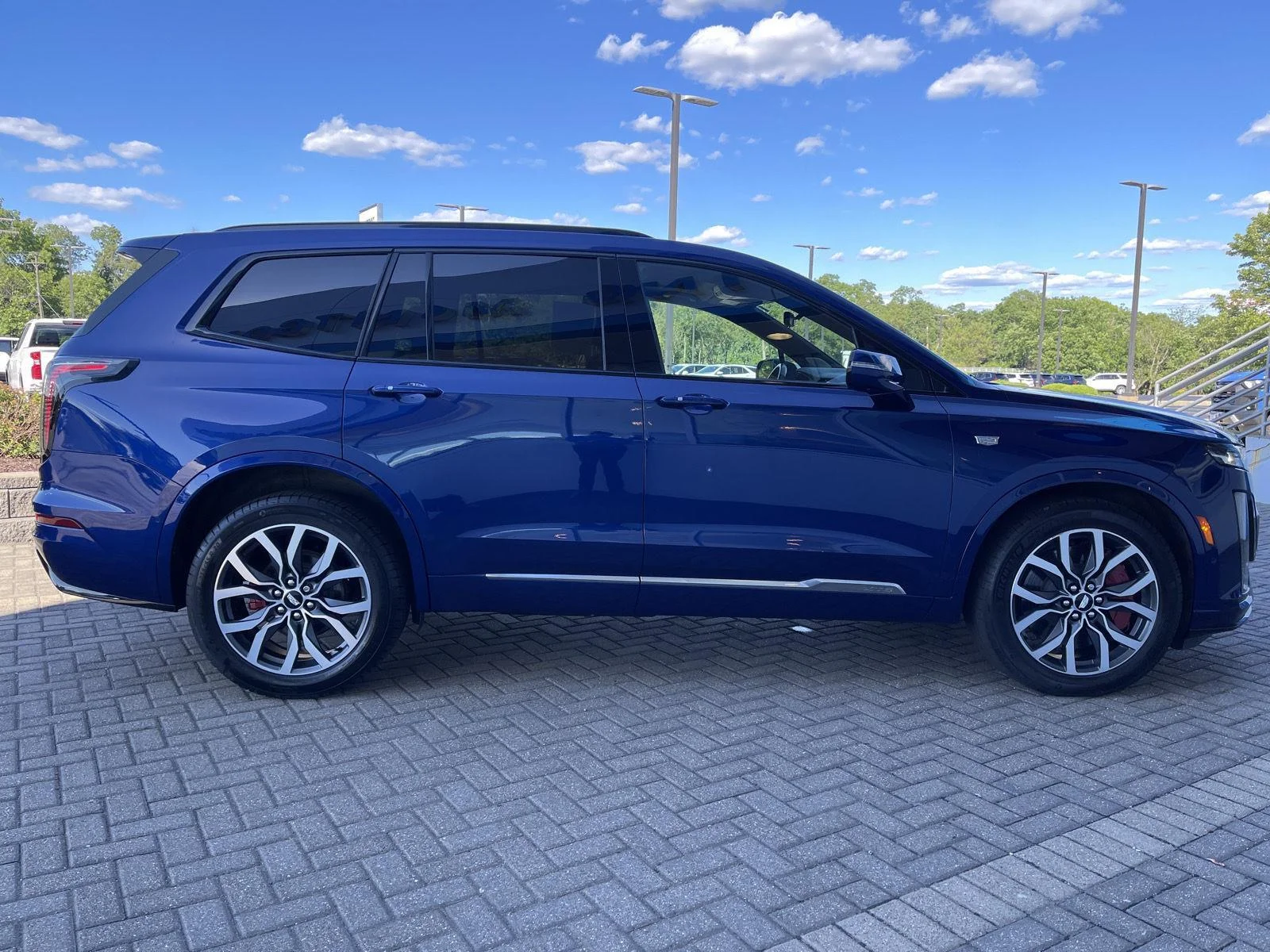 Used 2024 Opulent Blue Metallic Cadillac Sport image 6