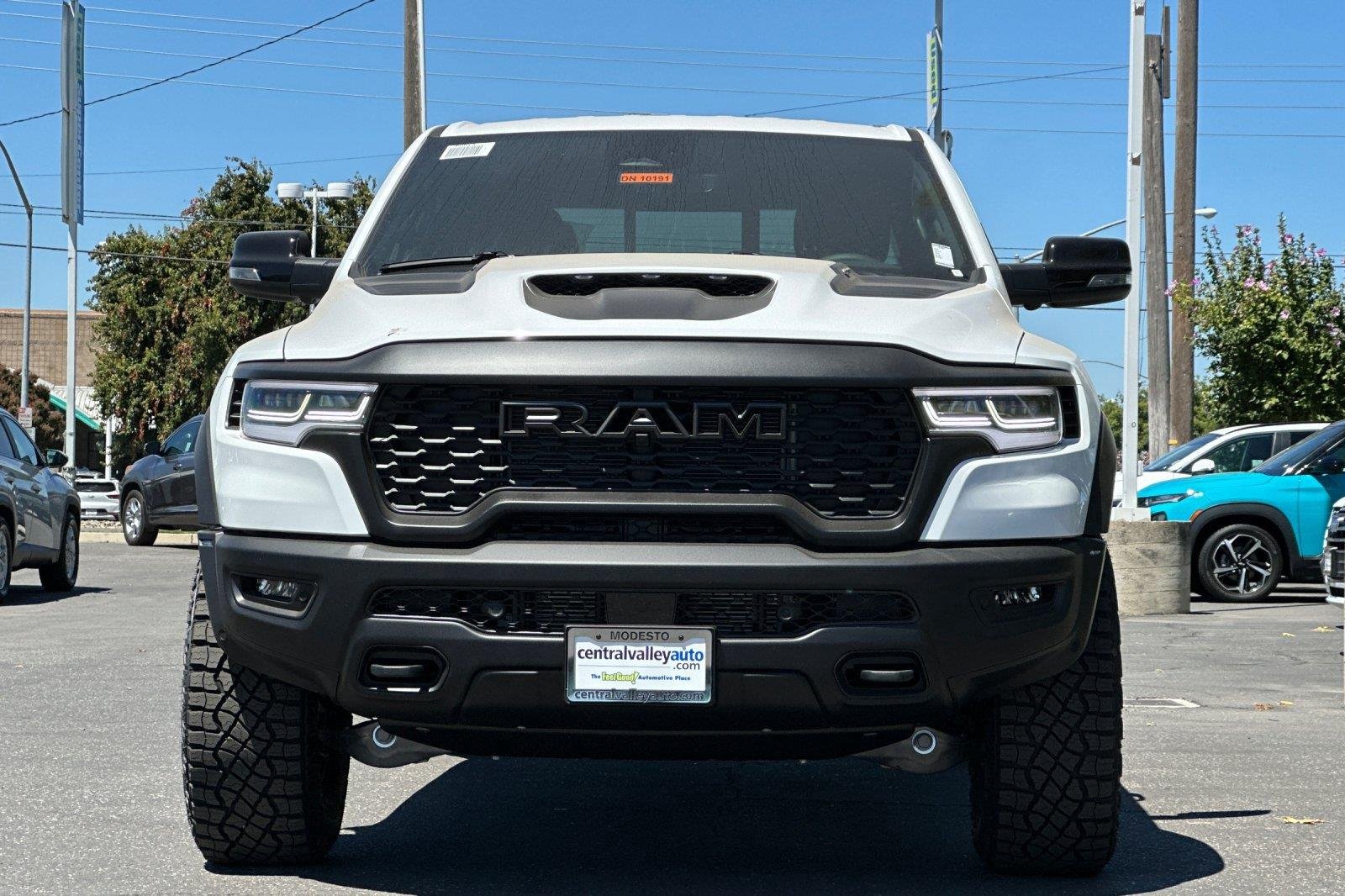 New 2026 Bright White Clearcoat Ram RHO image 9