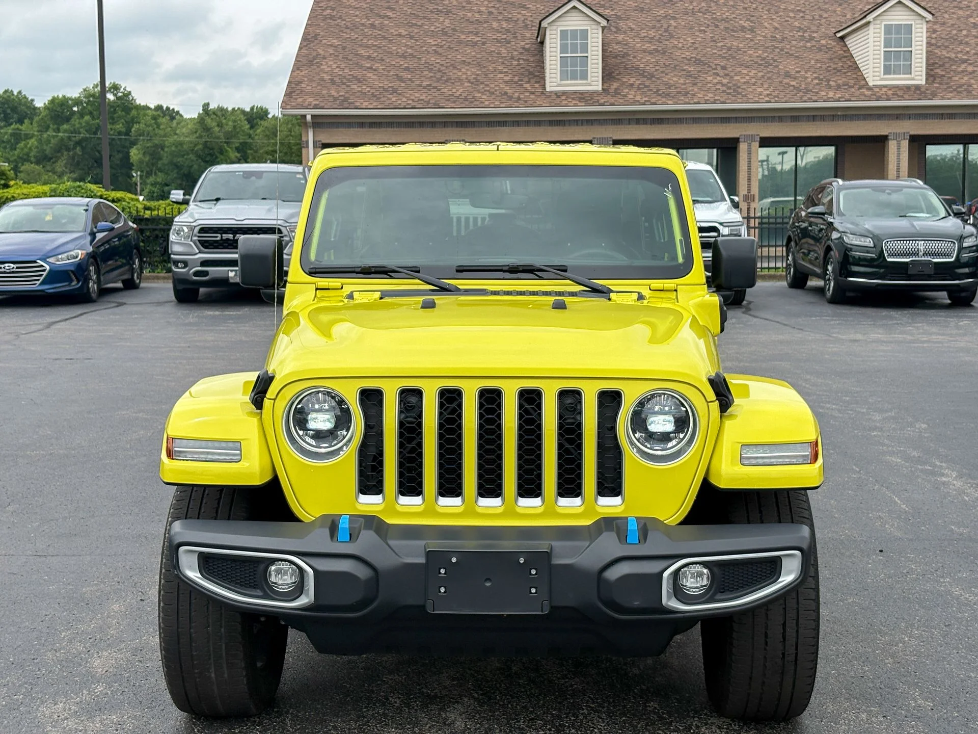 Used 2023 Yellow Jeep Sahara 4xe image 4