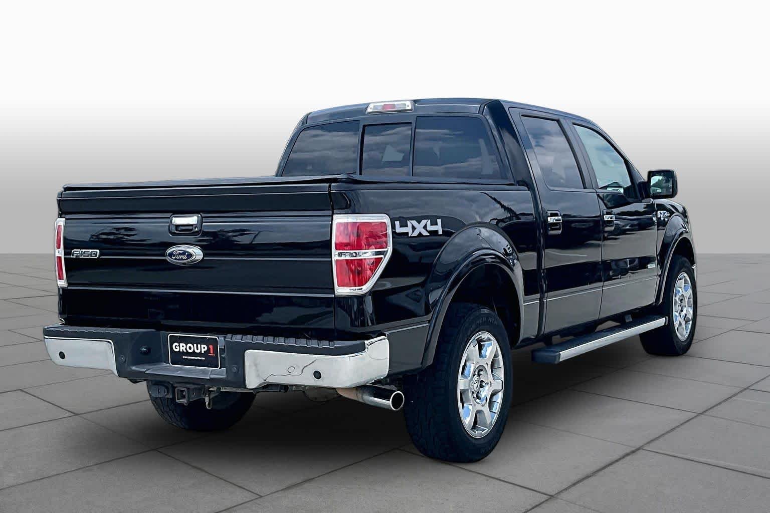 Used 2013 Tuxedo Black Metallic Ford Lariat image 11