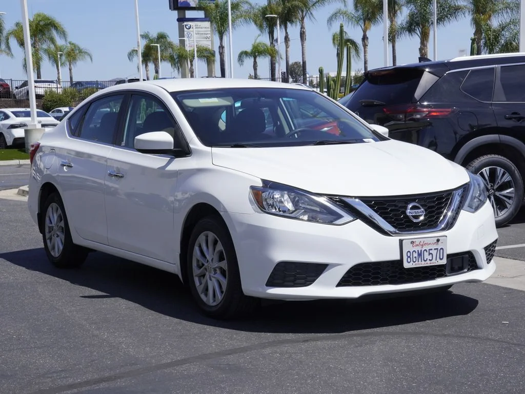 Used 2018 White Nissan SV image 1