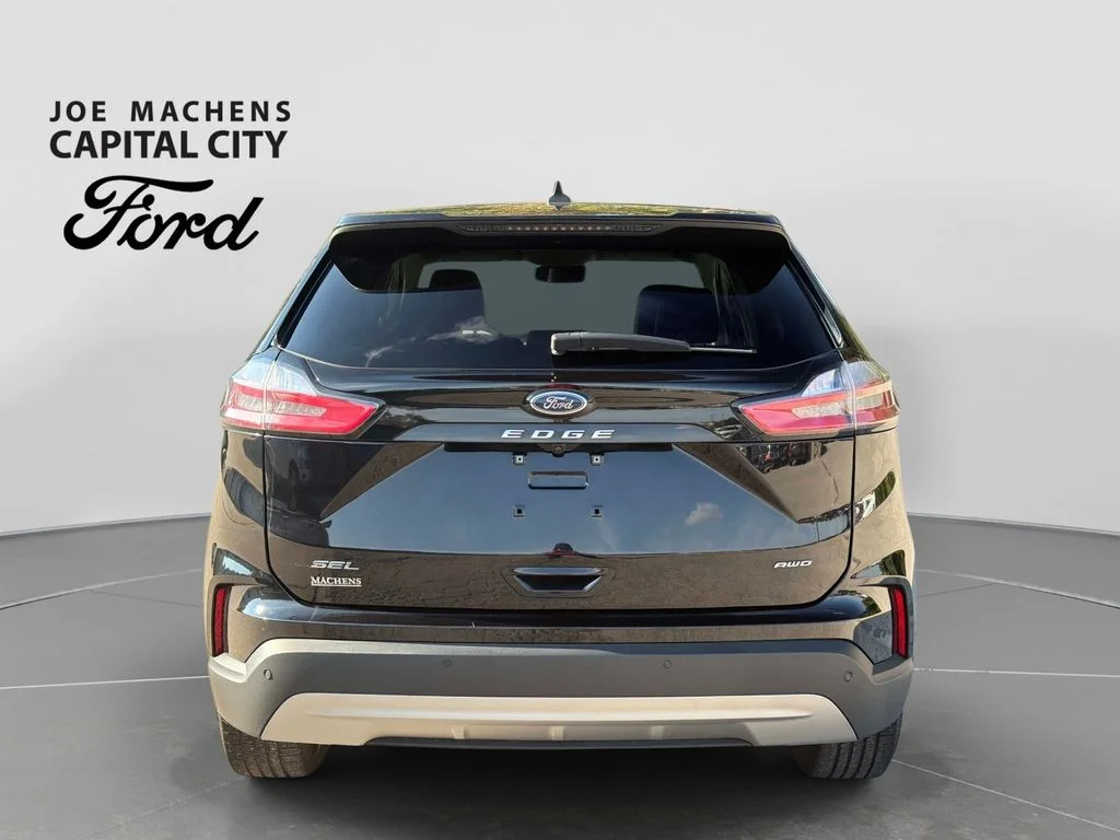 Used 2024 Agate Black Metallic Ford SEL image 6