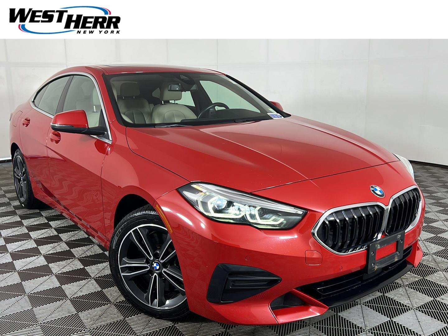 Used 2022 Melbourne Red Metallic BMW 228i xDrive image 1